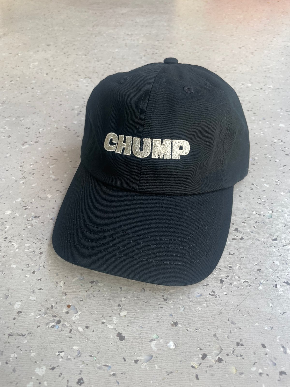 Black CHUMP cap w/ beige embroidery